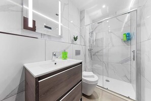 Shower, hair dryer, shampoo