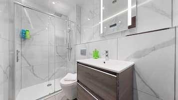 Shower, hair dryer, shampoo