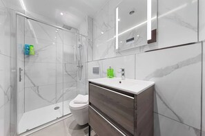 Shower, hair dryer, shampoo