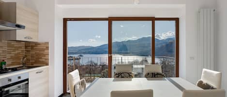 Fridge, stovetop, highchair, cookware/dishes/utensils