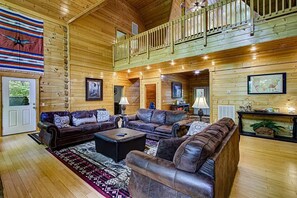 Télévision, cheminée, lecteur de DVD, espaces bureaux