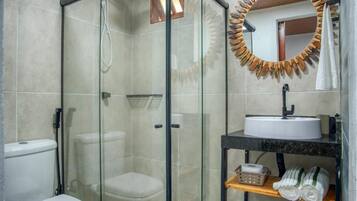 Shower, towels, soap, toilet paper