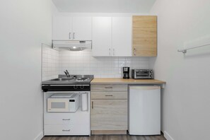 Microwave, coffee/tea maker, toaster, cookware/dishes/utensils