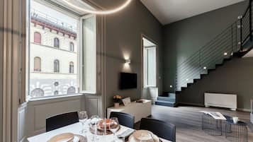 Apartment | Living area | 30-inch flat-screen TV with digital channels