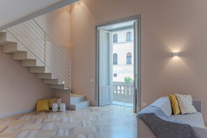 Premium bedding, down duvets, iron/ironing board, cots/infant beds