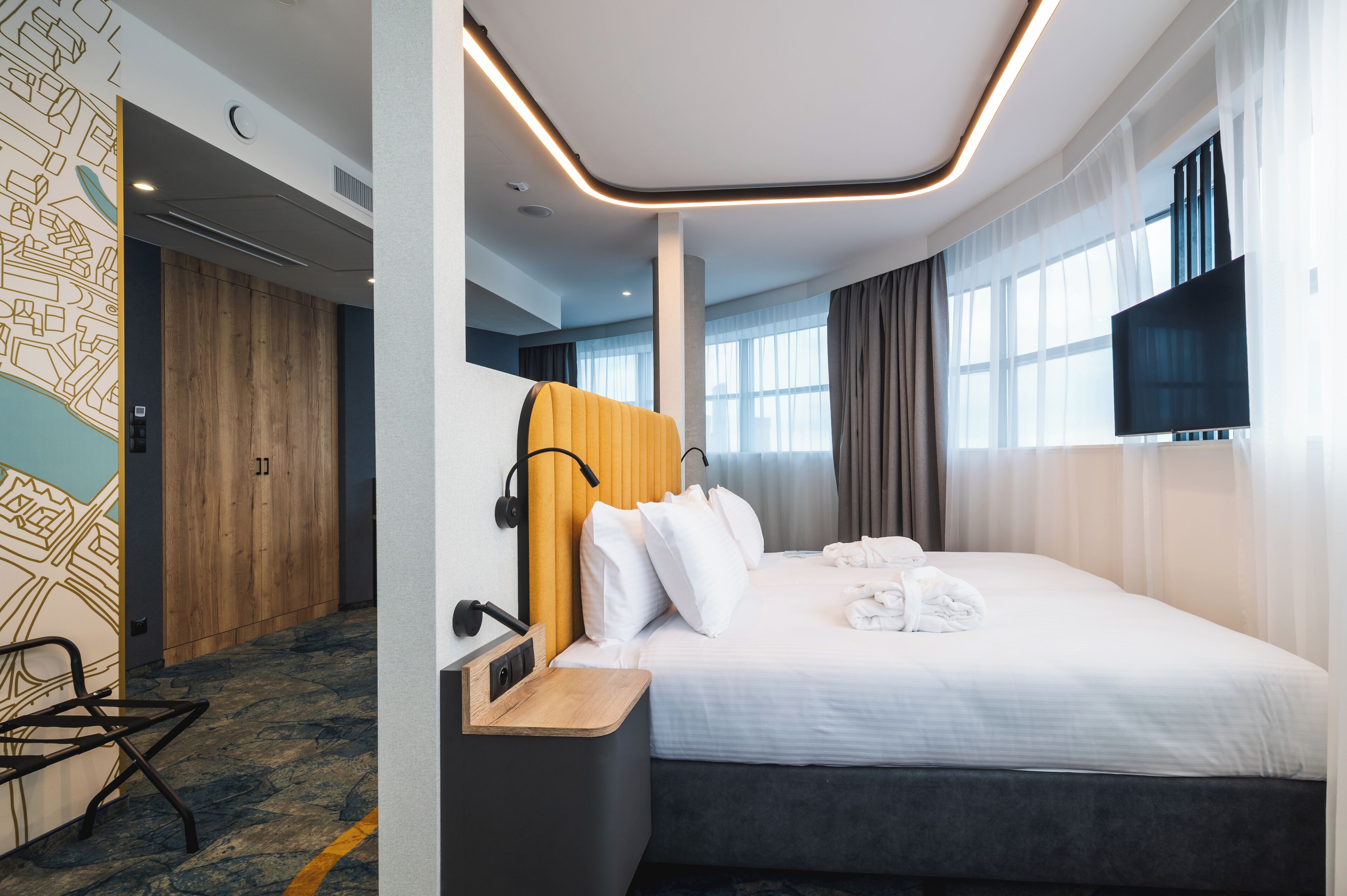 Desk, laptop workspace, blackout drapes, soundproofing