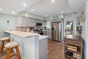 Fridge, microwave, oven, stovetop - Oceanfront Condo, OnSite Pool - Beach Daze (St. Augustine)