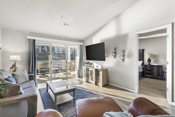 Condo, 1 King Bed with Sofa bed, Balcony, Golf View (Calm Waters Condo) | Living area | 42-inch flat-screen TV with digital channels