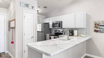 Condo, 1 King Bed with Sofa bed, Balcony, Golf View (Calm Waters Condo) | Private kitchen | Fridge, microwave, oven, stovetop