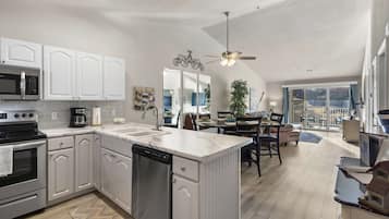 Condo, 1 King Bed with Sofa bed, Balcony, Golf View (Calm Waters Condo) | Private kitchen | Fridge, microwave, oven, stovetop