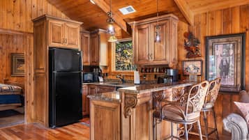 Cabin, 1 King Bed with Sofa bed, Patio, Garden View (Cabin at Rock Canyon) | Private kitchen | Fridge, microwave, oven, stovetop