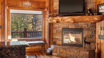 42-inch flat-screen TV with digital channels, fireplace