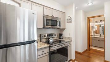 Condo, 1 Queen Bed with Sofa bed, Balcony, Garden View (Banta House Retreat at the Pointe) | Private kitchen | Fridge, microwave, oven, stovetop