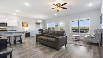 Condo, Multiple Beds, Balcony, Golf View (StoneBridge Escape) | Living area | 50-inch flat-screen TV with digital channels