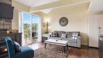 Condo, Multiple Beds, Balcony (Pondside Paradise Retreat) | Living area | 42-inch flat-screen TV with digital channels, fireplace