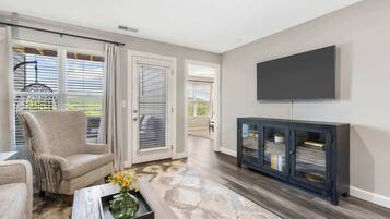 Condo, Multiple Beds, Balcony, Garden View (Earl Grey Escape ) | Living area | 42-inch flat-screen TV with digital channels