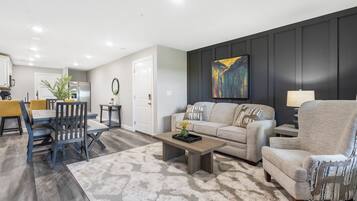 Condo, Multiple Beds, Balcony, Garden View (Earl Grey Escape ) | Living area | 42-inch flat-screen TV with digital channels