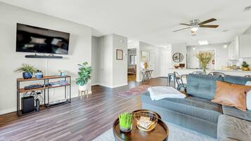 Condo, Multiple Beds, Balcony, Mountain View (Bright Stylish Condo w/ Balcony) | Living area | 42-inch flat-screen TV with digital channels