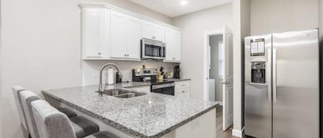 Condo, Multiple Beds, Patio, Garden View (Branson's Like Home Hideaway) | Private kitchen | Fridge, microwave, oven, stovetop