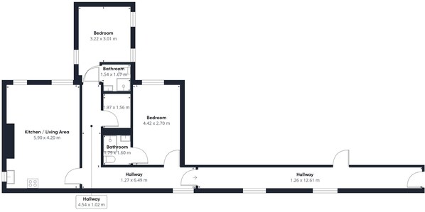 A floor plan of a hotel with two bedrooms, two bathrooms, a kitchen/living area, and two hallways. - Host & Stay | The Coach House, Apartment 2 (Saltburn-by-the-Sea)
