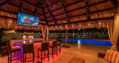 Golfers Green Retreat with 35' Heated Saltwater Pool & Tiki. Pet Friendly!