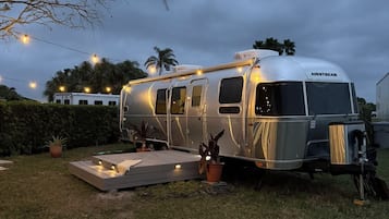 Experience the freedom of the open road in this AIRSTREAM motorhome, perfect for camping and travel adventures.