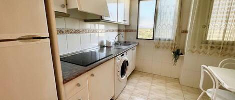 Fridge, microwave, coffee/tea maker, electric kettle