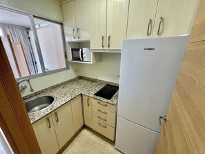 Fridge, microwave, coffee/tea maker, electric kettle