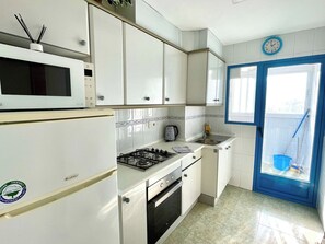 Fridge, microwave, oven, coffee/tea maker