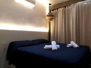 2 habitaciones, tabla de planchar con plancha y cuna de viaje