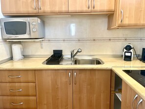 Fridge, microwave, coffee/tea maker, electric kettle