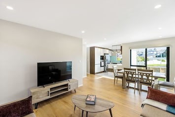 The open-plan living, dining and kitchen areas are on the ground floor.