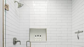 Shower, hair dryer, towels, shampoo