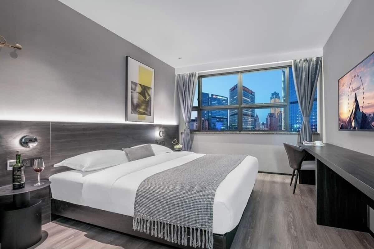 Premium bedding, down duvets, memory-foam beds, minibar