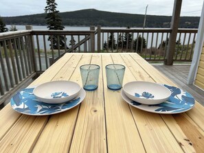 Outdoor dining - Oceanfront Cottage | Walk to Trail & Boat Tours (Bay Bulls)