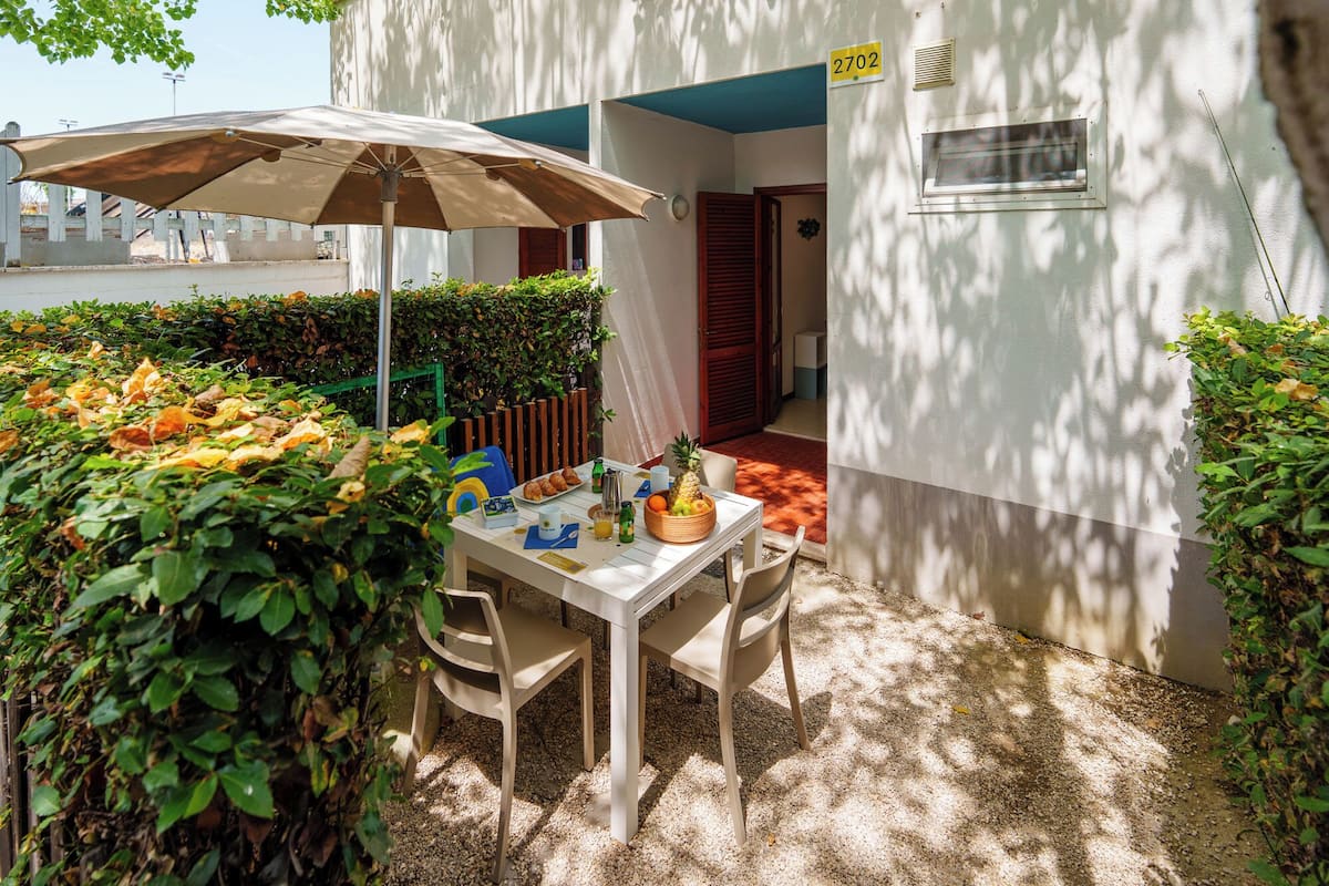 Bungalow, vista al jardín | Terraza o patio