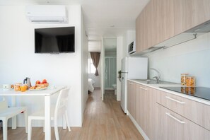 Comfort Mobile Home | Living area | TV - Club Del Sole Le Mimose Family Resort (Porto Sant'Elpidio)