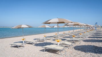 Private beach, black sand, beach bar