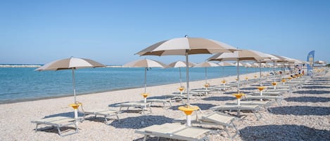 Private beach, black sand, beach bar