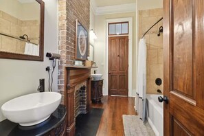 Shower, hair dryer, towels, shampoo