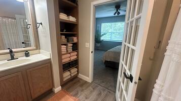 Hair dryer, towels, soap, toilet paper