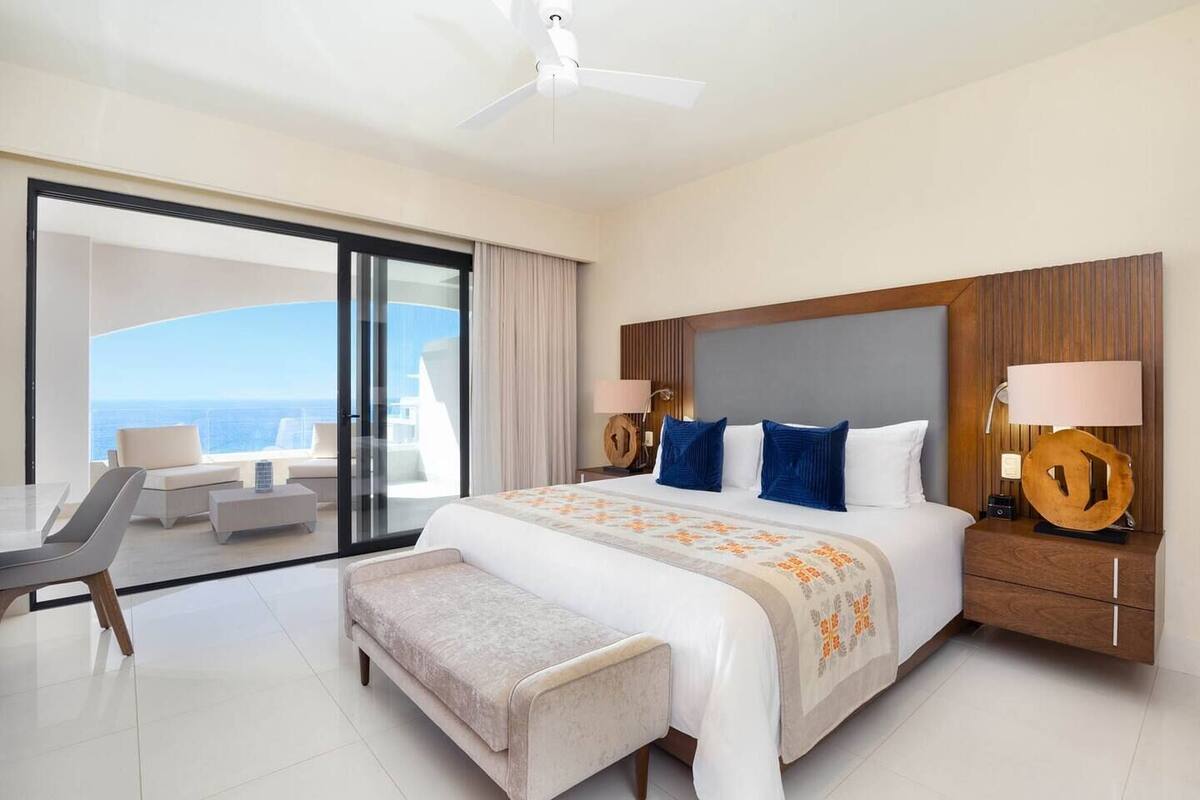 Deluxe Suite, 2 Bedrooms, Kitchen, Ocean View | 2 bedrooms, in-room safe, blackout drapes, iron/ironing board