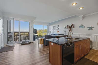 Oceanfront condo with king suite, balconies, & pet-friendly comfort—steps from the sand!