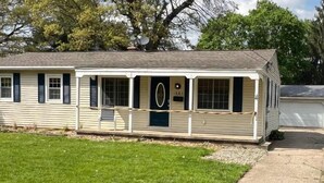 A single-story mobile home with a front porch, a satellite dish, and a mailbox. - Inground Pool w/ Fully fenced Yard/ Arcade/  6 beds incl Tri-Bunk/ Theatre  (Wyoming)