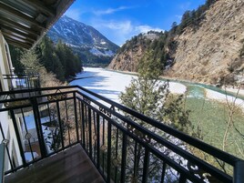 Deluxe Double Room, River View | Balcony view