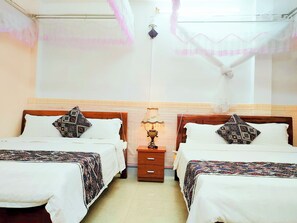 Eenvoudige kamer, 1 twee- of 2 eenpersoonsbedden, 2 queensize bedden, niet-roken | Gratis wifi