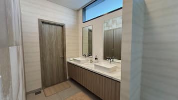 Shower, hair dryer, soap, shampoo
