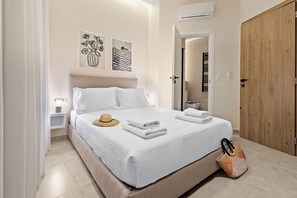 Economy Double Room | Hypo-allergenic bedding, minibar, in-room safe, individually decorated - Enea City Suites (Heraklion)