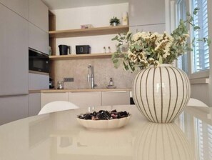 Fridge, microwave, oven, stovetop - Charming Peony Apartment in Dubrovnik: 2-Bedroom Retreat with Scenic Views (Dubrovnik)