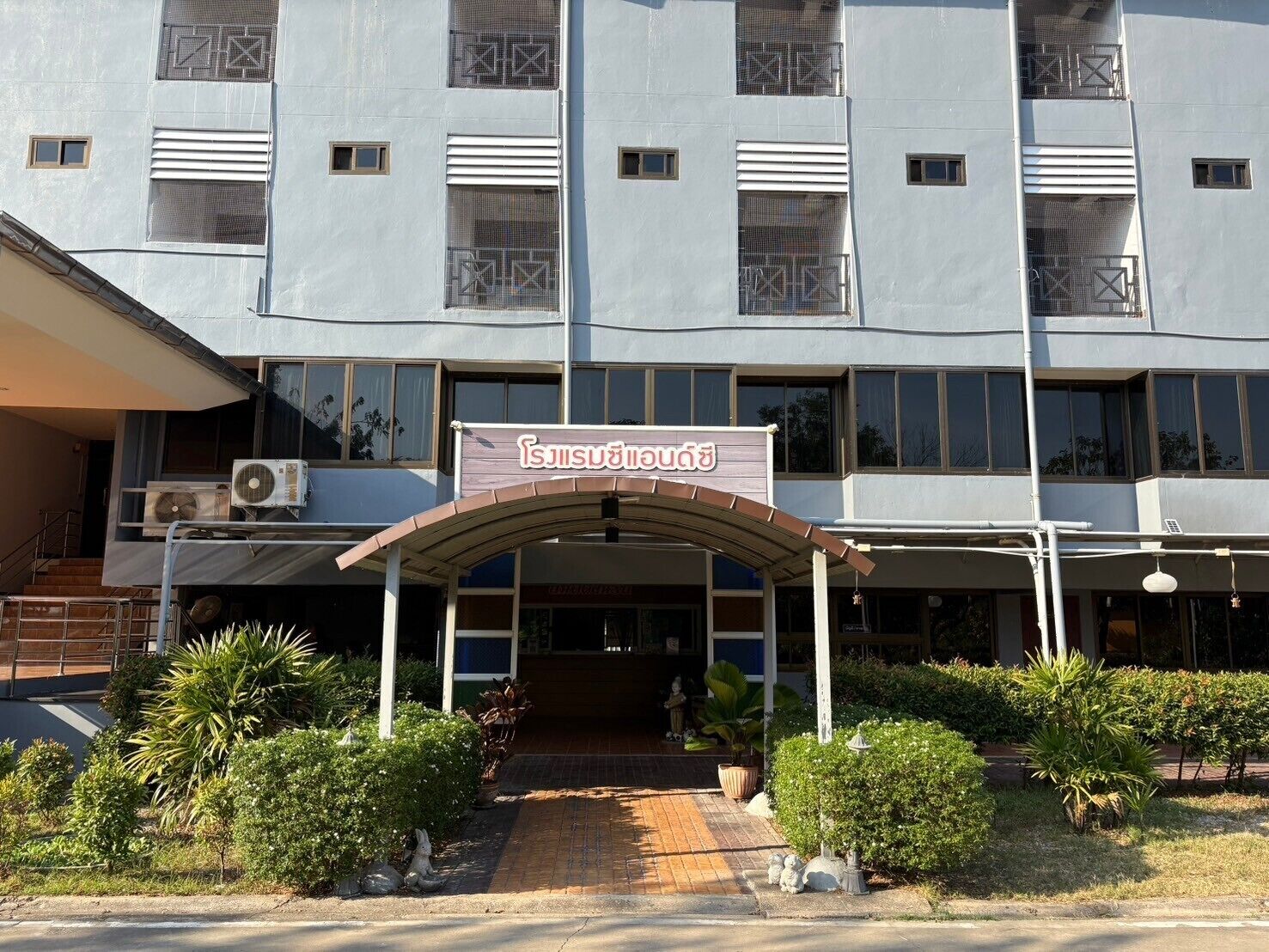 A building with a sign reading "Hotel".